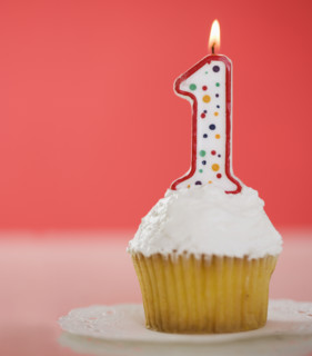 One candle on a cupcake.