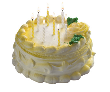Cake with lit candles.