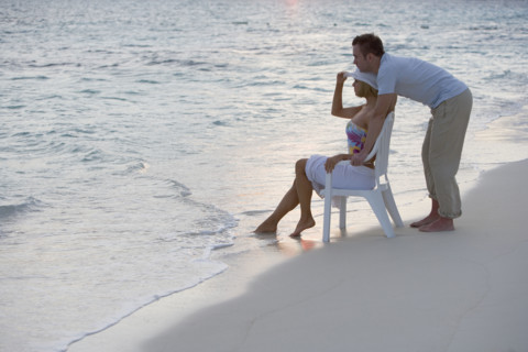 Couple relaxing at the beach.