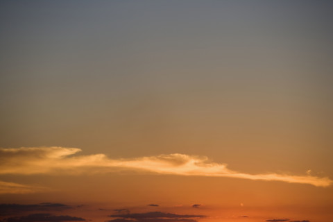 Thin band of clouds.