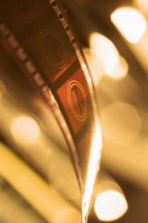 Film frames with light shining through.