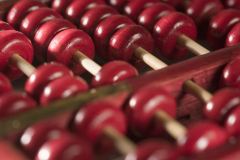 Closeup of a wooden abacus.
