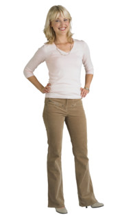 Woman standing with hands on hips.