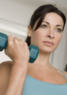 Woman lifting weights.