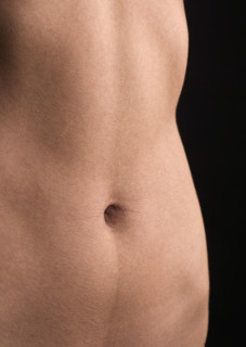 Nude female torso.