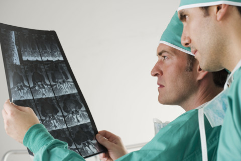 Doctors looking at x-rays.
