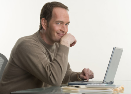 Portrait of a man at his computer.