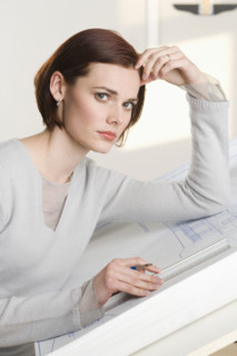Portrait of woman at drawing board.