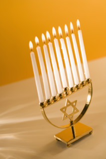 A fully lit menorah.