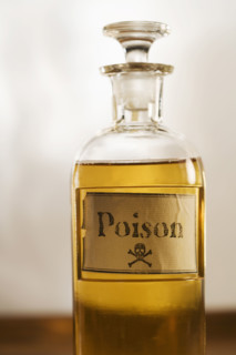 Still life of a bottle of poison.