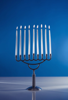 A fully lit menorah.