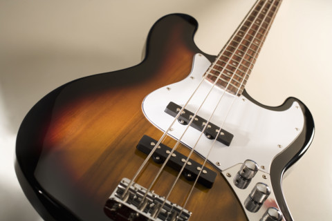 Still life of a bass guitar.