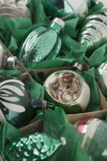 A box of Christmas ornanaments.