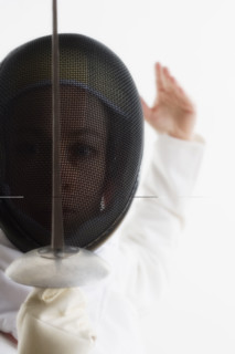 Closeup of a fencer.