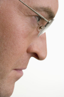 Profile view of a serious man.