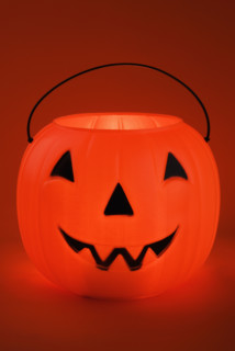 Still life of a plastic pumpkin.