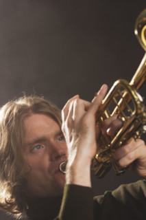 Man playing horn.