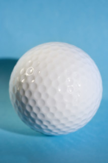 Closeup of a golf ball.