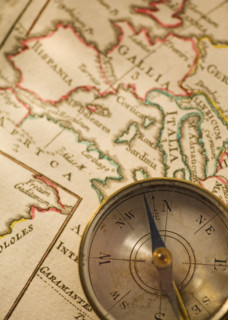 Antique compass and map.