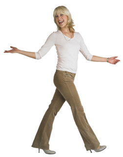 Woman walking with arms outstretched.