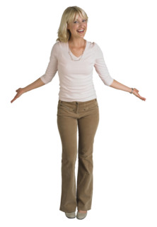 Woman gesturing with arms outstretched.