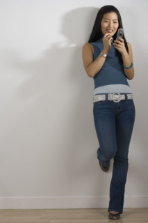 Young woman using a mobile phone.
