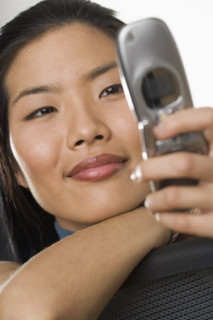 Young woman using a mobile phone.