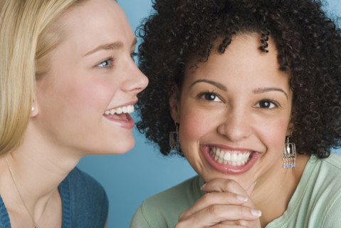 Closeup of two smiling women.