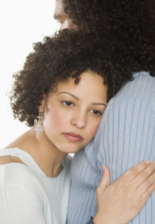 Closeup of a serious couple.