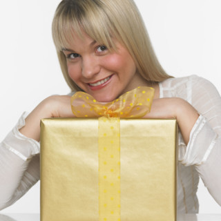 Studio shot of woman with gift.