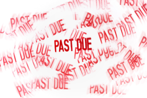 Studio shot of Past Due stamp.