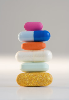 Close up of stacked pills.
