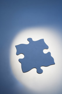 Blue jigsaw puzzle piece.