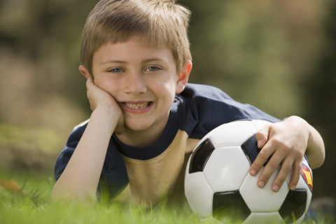 Young boy with soccer ball.