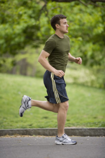 Man jogging in park.