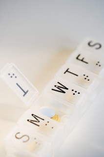 Close up of pill organizer.