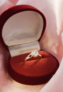 Still life of diamond engagement ring.