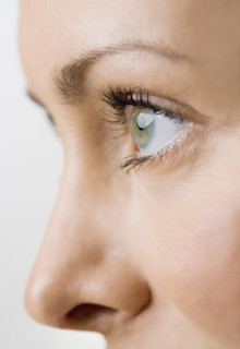 Close up profile of a womans face.
