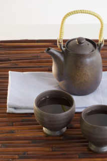 Close up of teapot and cups.