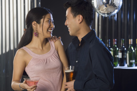 Couple having drinks in a bar.