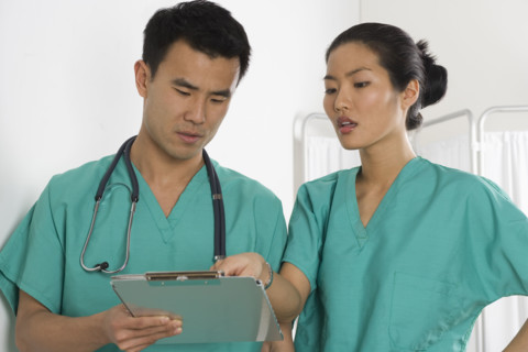 Two doctors conferring.