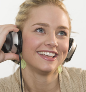 Young woman wearing headphones.