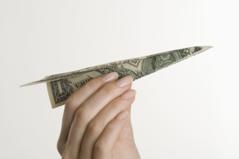 Paper airplane made of money.