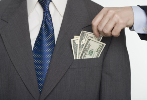 Businessman picking a pocket.