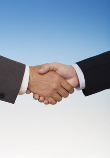 Businessmen shaking hands.
