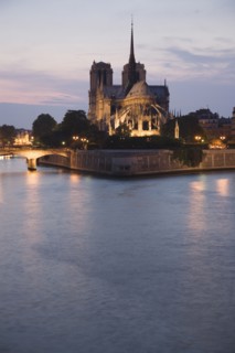 Notre-Dame de Paris
Scenic view of cathedral next to water at night.