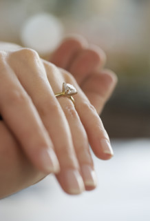 Close up of diamond engagement ring.