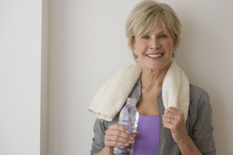 Portrait of senior woman wearing athletic gear.