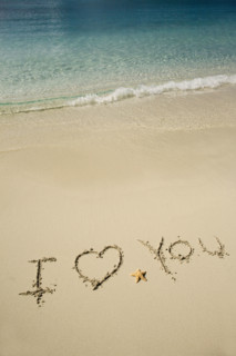 I Love You written in sand.