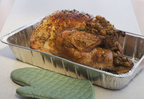 Close up of Thanksgiving turkey in pan.